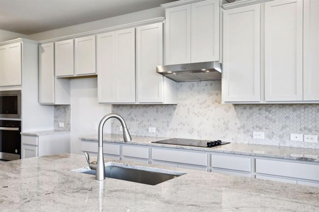 Photo is not of the actual home but is an inspirational photo of builder’s model home and may depict options, furnishings, and/or decorator features that are not included. | Image 9