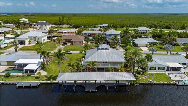 24261 Captain Kidd Blvd, House other with 3 bedrooms, 3 bathrooms and null parking in PUNTA GORDA FL | Image 52