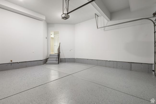Garage with a garage door opener | Image 29