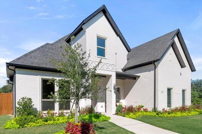 Gorgeous curb appeal adorns this beautiful home! | Image 2