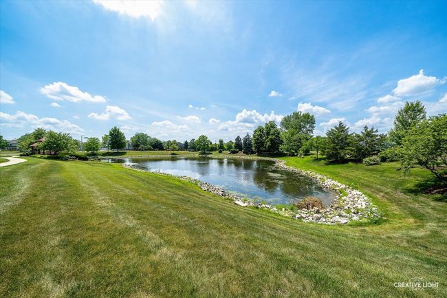 Enjoy pond views from the front of the home. | Image 30