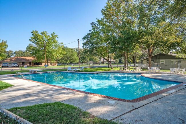 Neighborhood pool is walking distance to this home. | Image 25