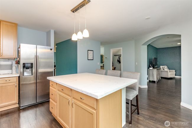 Note the arched entry into the family room. | Image 9