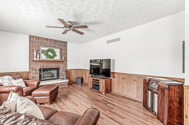 Family Room with Gas Log Fireplace | Image 15