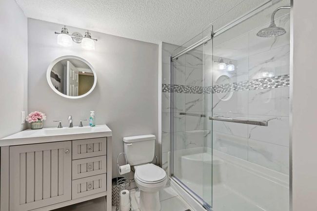 716 Boulder Creek Drive Se, House other with 4 bedrooms, 4 bathrooms and 4 parking in Langdon AB | Image 37
