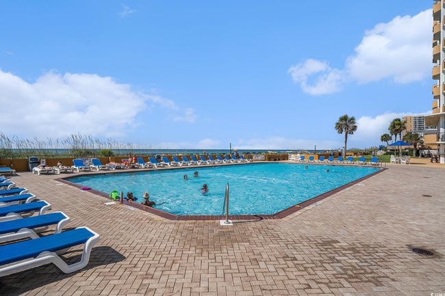 Community pool featuring a patio area | Image 37