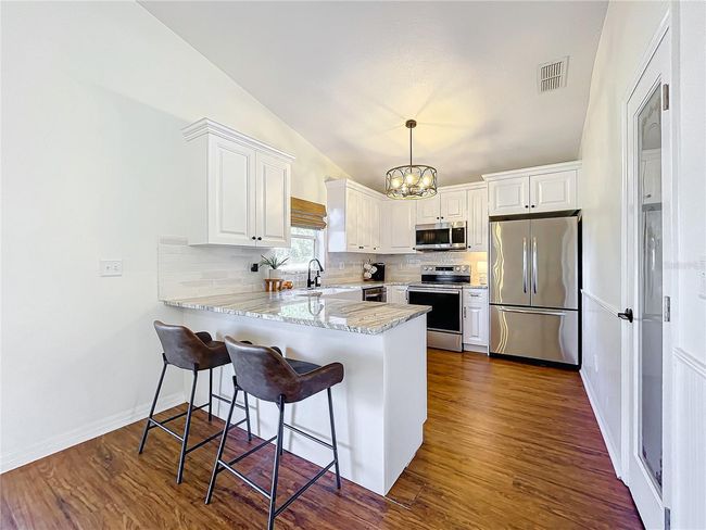 865 Scenic View Cir, House other with 3 bedrooms, 2 bathrooms and null parking in Minneola FL | Image 12