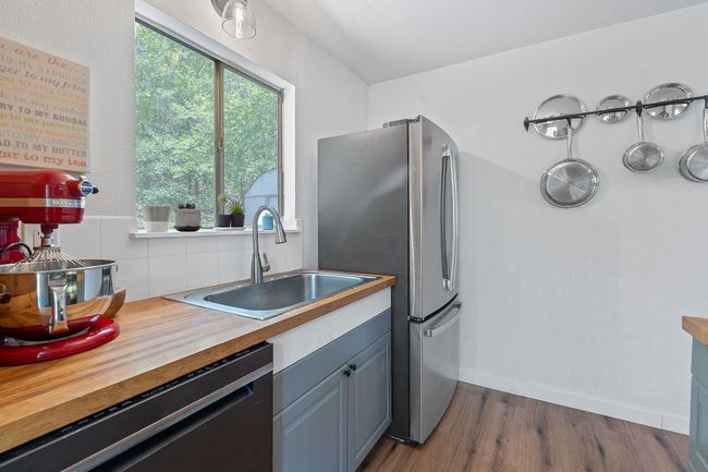 Large window overlooking the private backyard | Image 11