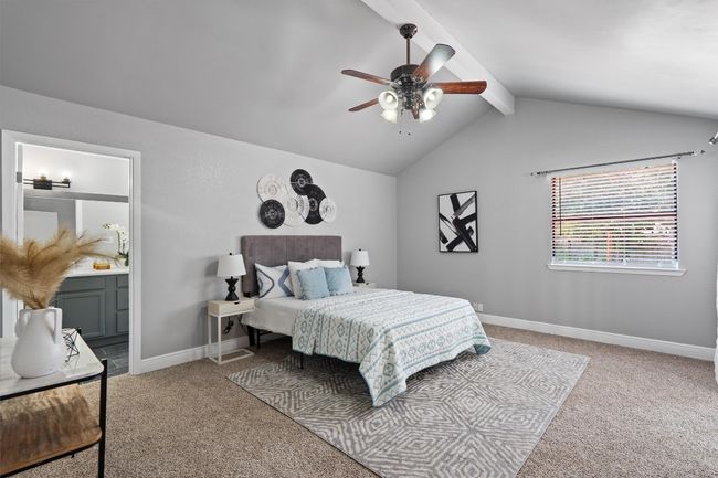 Bedroom featuring carpet floors, ensuite bath, and a ceiling fan | Image 14