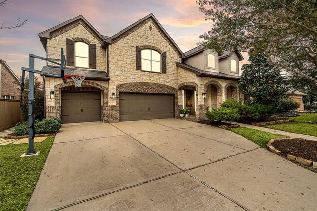Notable upgrades include a secret LED-lit room, three walk-in attics for ample storage, and a show-stopping wine display. | Image 7