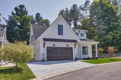 13921 S Winding Trail, Home with 3 bedrooms, 2 bathrooms and null parking in Traverse City MI | Image 2