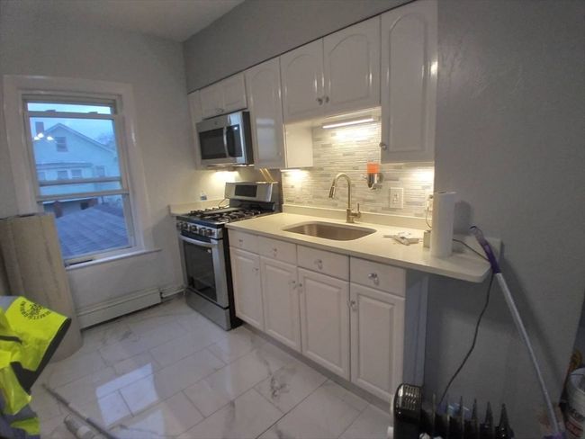 14 Russell St, Home with 6 bedrooms, 2 bathrooms and 5 parking in Everett MA | Image 12