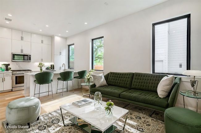 Living room with light wood-style floors and recessed lighting | Image 4