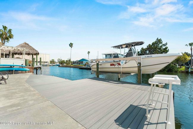 10K Boat Lift, Fishing Station, Composite Deck & Dock with Steps into the Water | Image 9