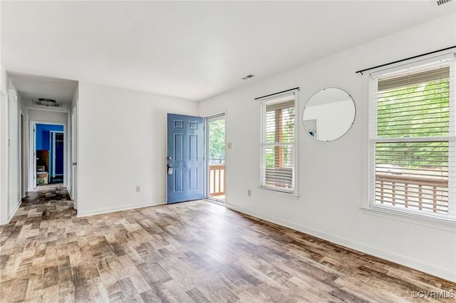 Unfurnished room featuring light wood finished floors and baseboards | Image 7
