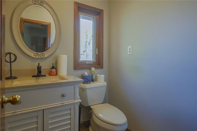 Half bathroom on main level off kitchen | Image 19