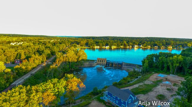 Perched among the hills along the Thornapple River...and just a flycast from Ada's charming downtown, remarkable destination neighborhood for those in tune with nature and community. | Image 51