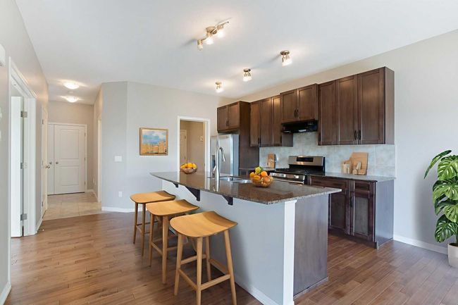 32 Drake Landing Hill, House other with 3 bedrooms, 3 bathrooms and 4 parking in Okotoks AB | Image 5