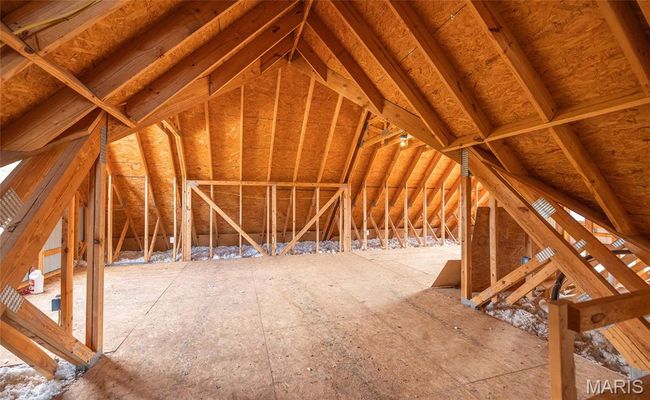 The attic has a dumbwaiter for easily storing heavy items in the attic. | Image 58