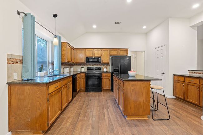 You'll love all the space in the kitchen, where multiple chefs can work together preparing memorable home cooked meals. | Image 17