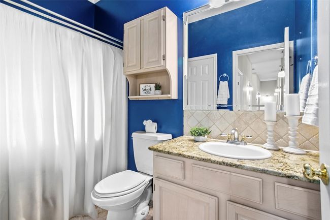 Main floor secondary bedroom with ensuite bathroom | Image 21