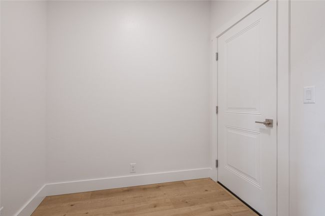 Spare room with light wood-style flooring and baseboards | Image 25