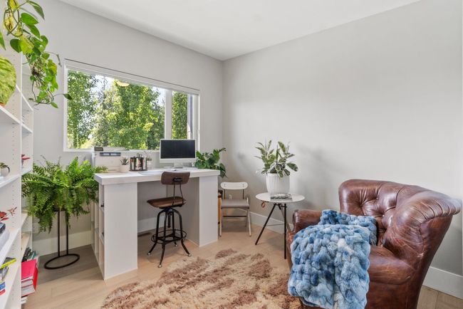 Office featuring light wood-type flooring and baseboards | Image 18