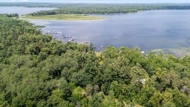 The area is surrounded by old-growth white and red pine trees, offering breathtaking sunsets, and opportunities to observe loons, eagles, and other wildlife. | Image 34