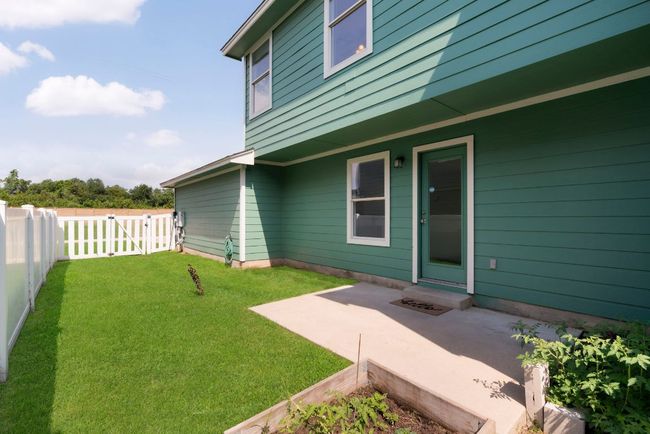 There are no back neighbors ensuring a private outdoor retreat. enhanced to show seasonality and potential. | Image 29