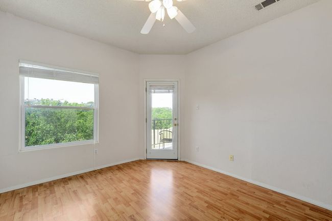 Another view of the primary bedroom. | Image 13