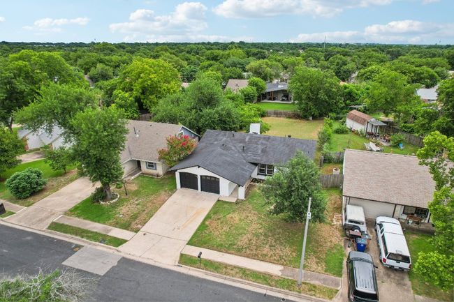 Birds eye view of property with a forest view | Image 32