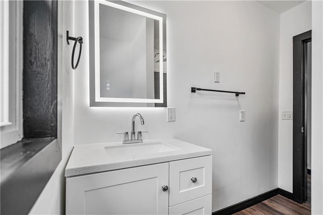 Bathroom featuring vanity | Image 31