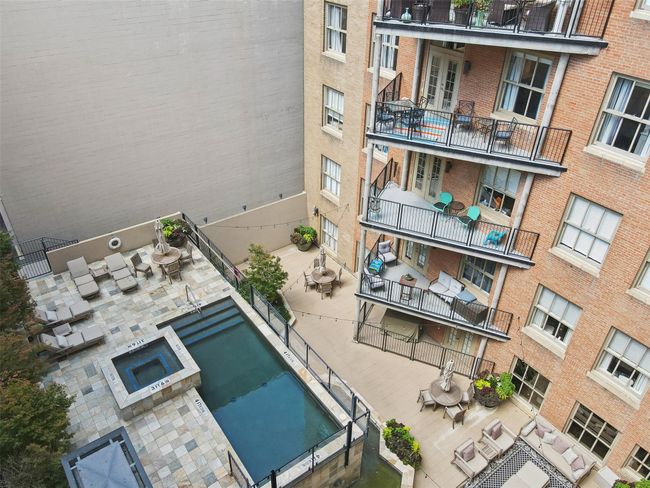 View of swimming pool with a patio area and french doors | Image 28