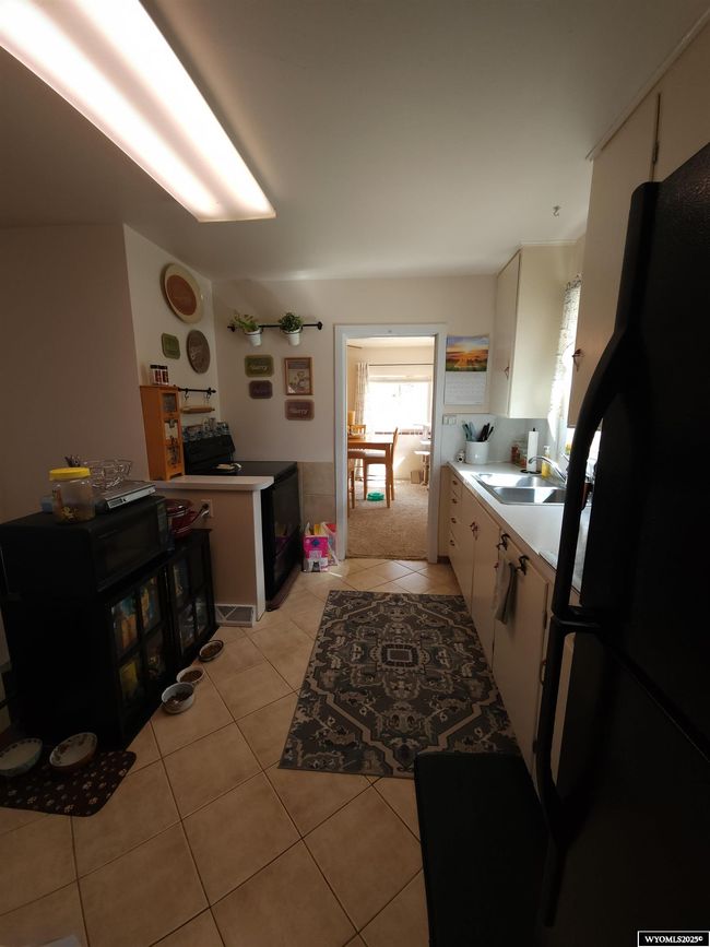 301 11 Th St, House other with 3 bedrooms, 1 bathrooms and null parking in Wheatland WY | Image 10