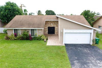 8310 Nw 54th Ct, House other with 3 bedrooms, 2 bathrooms and null parking in Lauderhill FL | Image 3