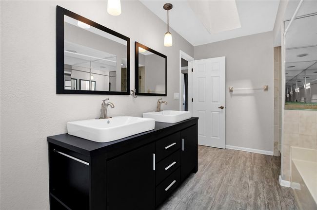 Jack & Jill Guest Bathroom comes with Tub and a walk in Shower | Image 45