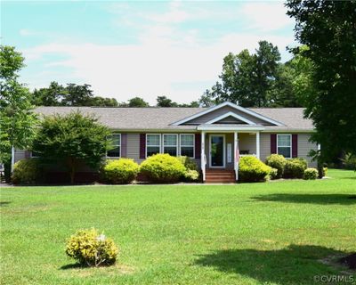 Single story home with a front lawn | Image 1