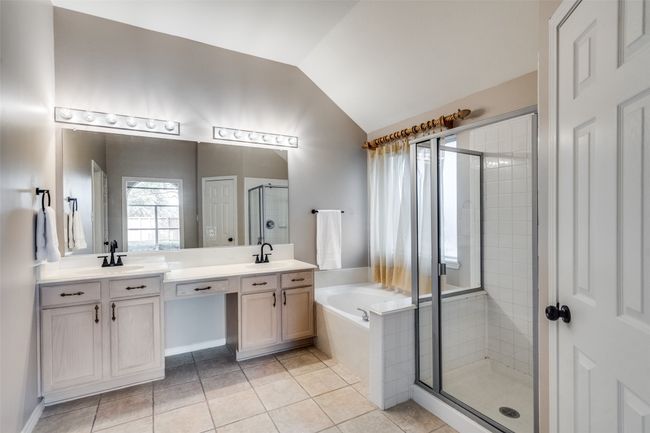 Ensuite bath includes separate shower and large walk in closet with built ins. | Image 13