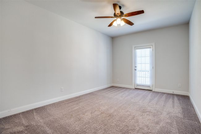 Spare room featuring carpet flooring and a ceiling fan | Image 19