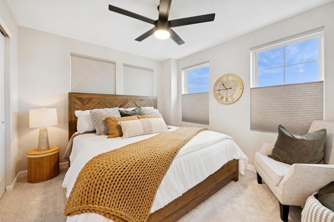 Spacious second bedroom on the same level, featuring a large closet and plenty of room to move comfortably—even with an oversized queen bed. | Image 31