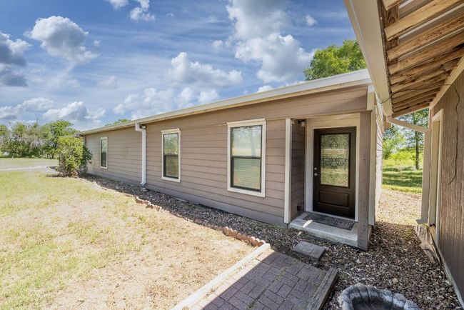 Property entrance featuring a yard | Image 30