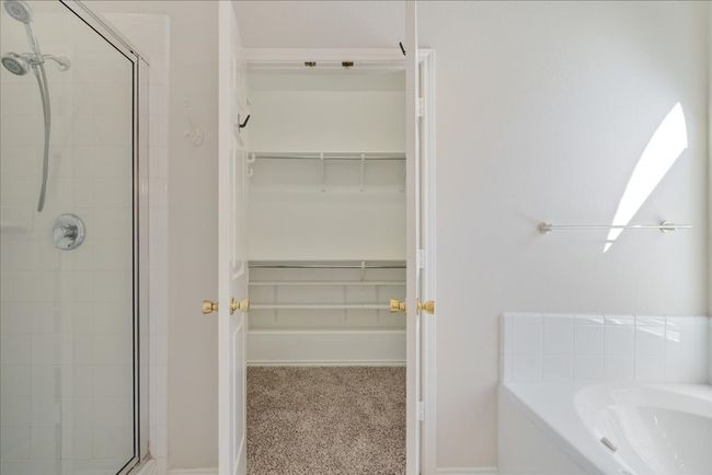 Full bathroom with walk in closet | Image 13