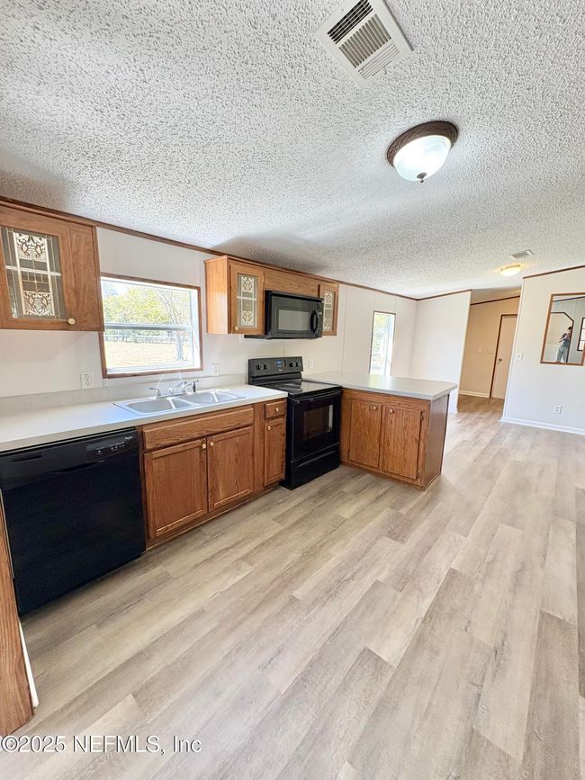 7598 Madison Dr, House other with 4 bedrooms, 2 bathrooms and null parking in Glen St. Mary FL | Image 12