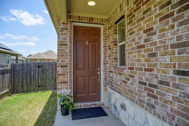 Property entrance featuring brick siding | Image 14