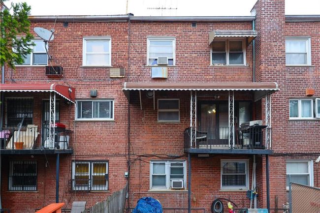 View of building exterior featuring cooling unit | Image 30