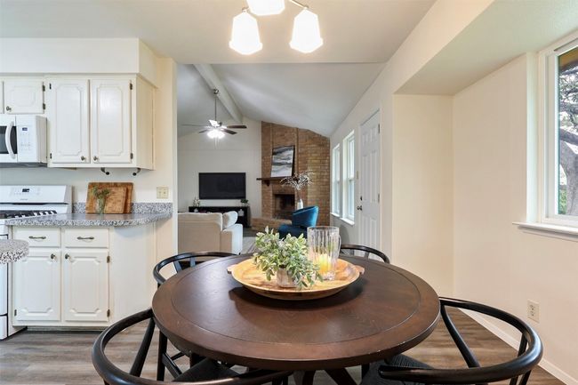 Dining room open to kitchen and living. | Image 11
