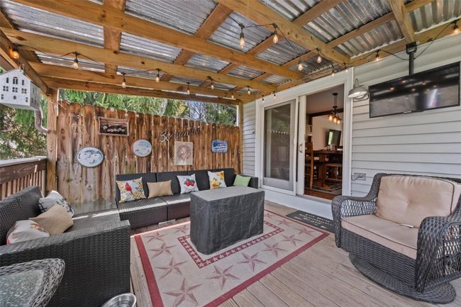 Wooden terrace with outdoor lounge area | Image 27