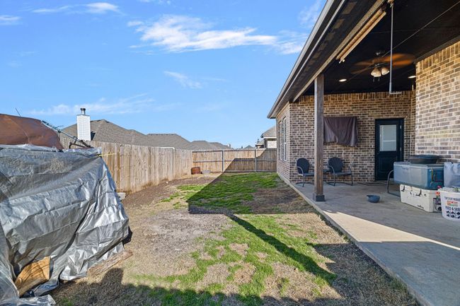 View of yard featuring a patio and a fenced backyard | Image 32