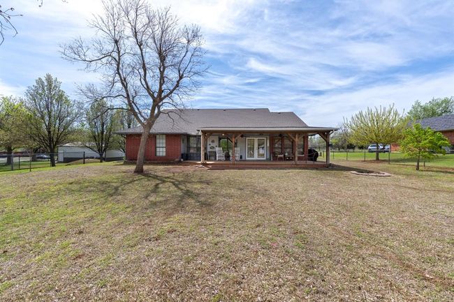 Back of house featuring french doors, a yard, and fence | Image 30