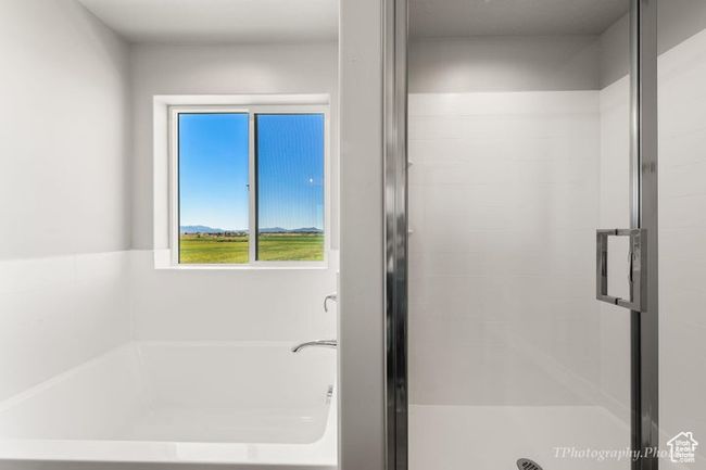 Bathroom with a garden tub and a stall shower | Image 17